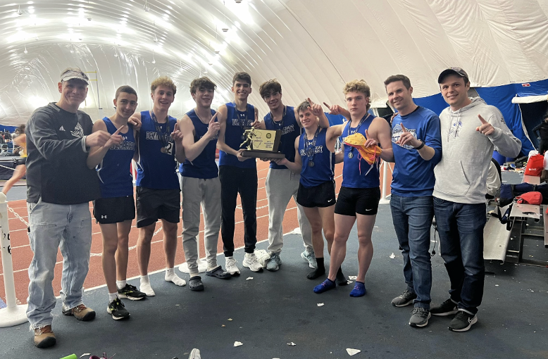 Boys winter track team winning Group 2 state indoor championship last year